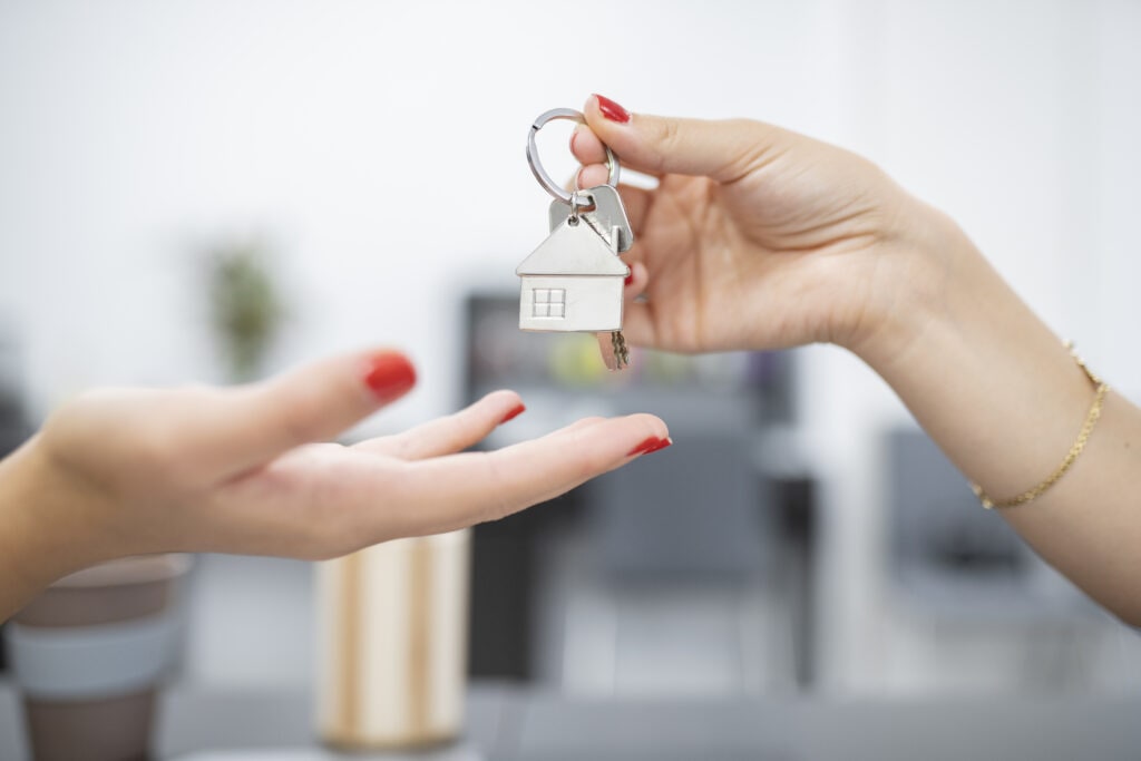 hands handing over keys for property purchase 2022 03 30 04 55 31 utc